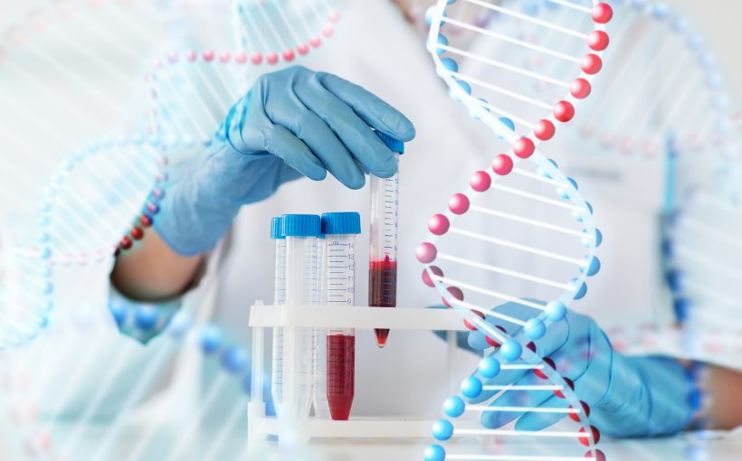 close up of scientist with tube making test in lab