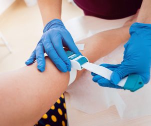 Injection during the blood collection. Diagnostic, healthcare, medical service