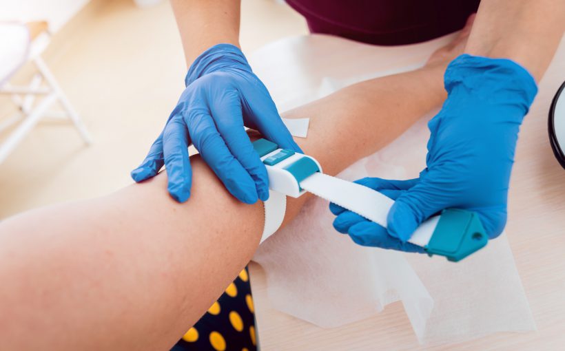 Injection during the blood collection. Diagnostic, healthcare, medical service